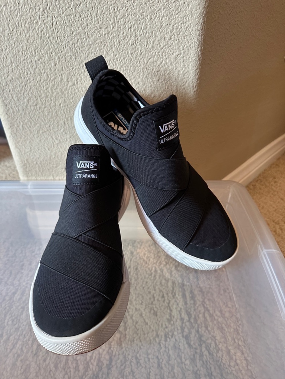 Vans Ultrarange Slip-On Sneakers in Black and White